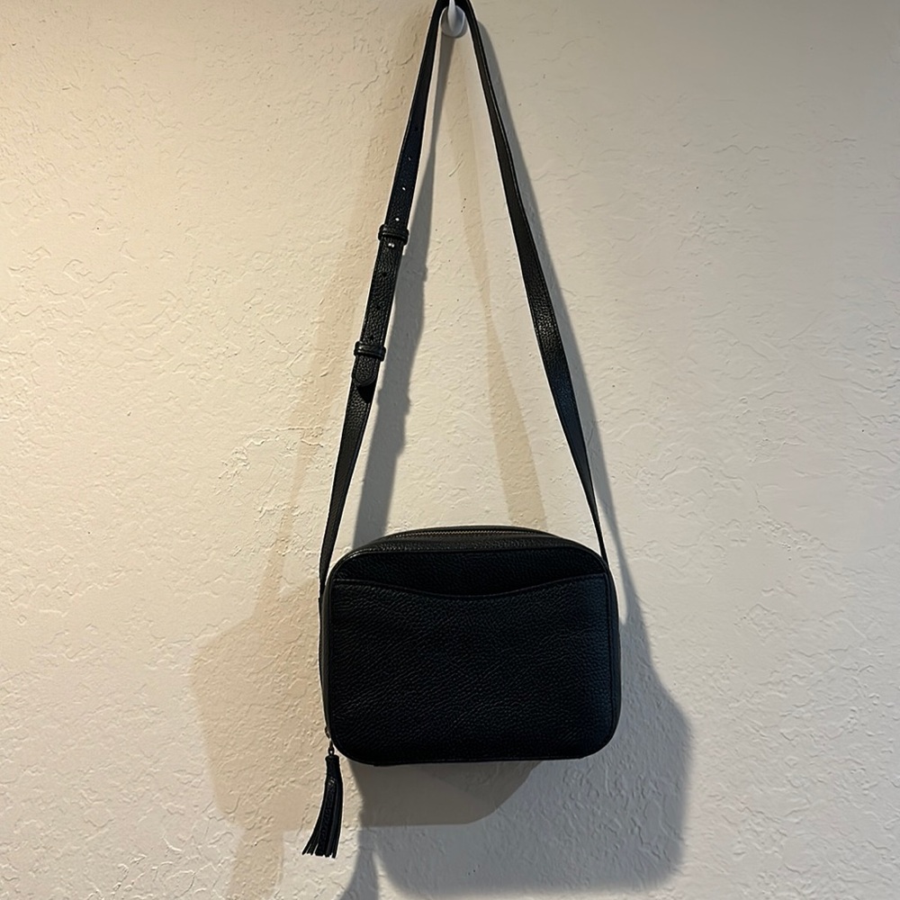 Cuyana mini tassle bag in black